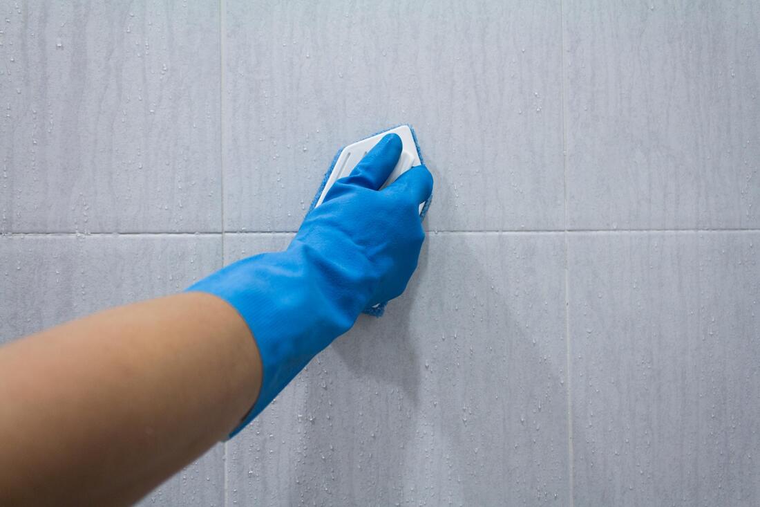 scrubbing off the tiles