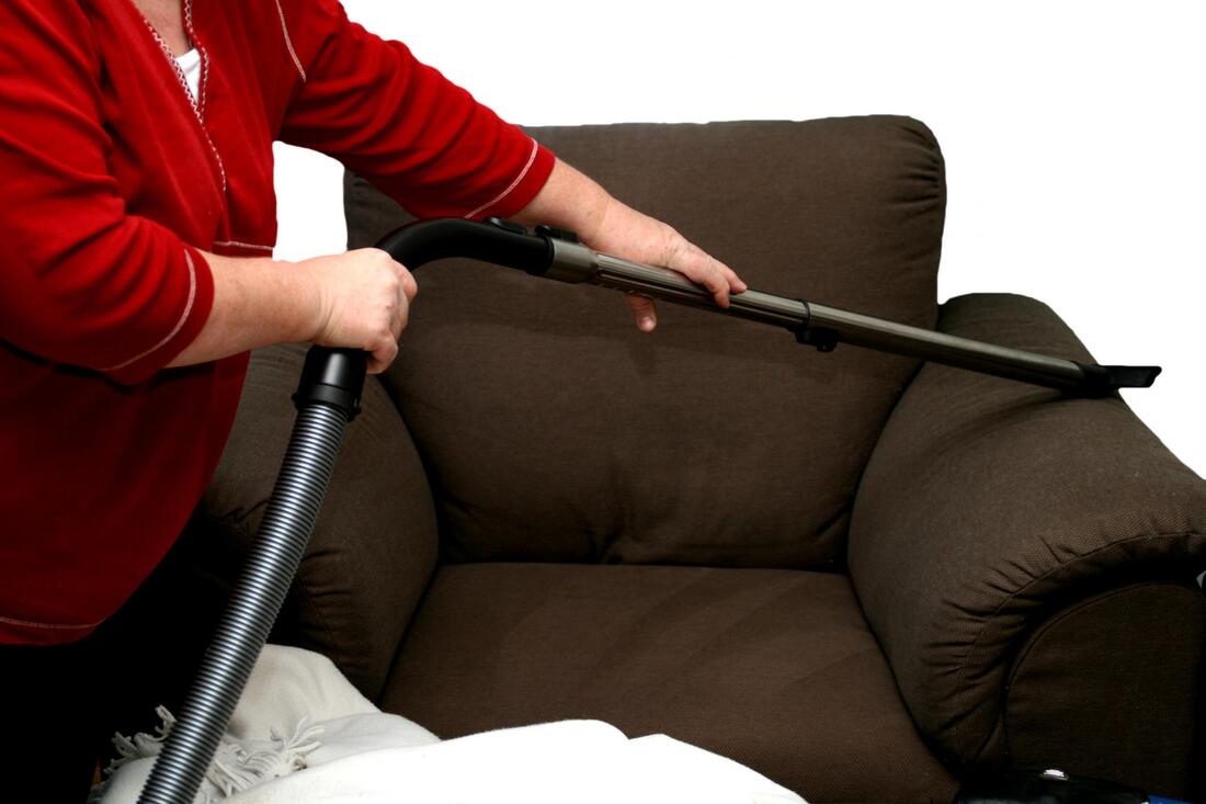 vacuuming of the couch